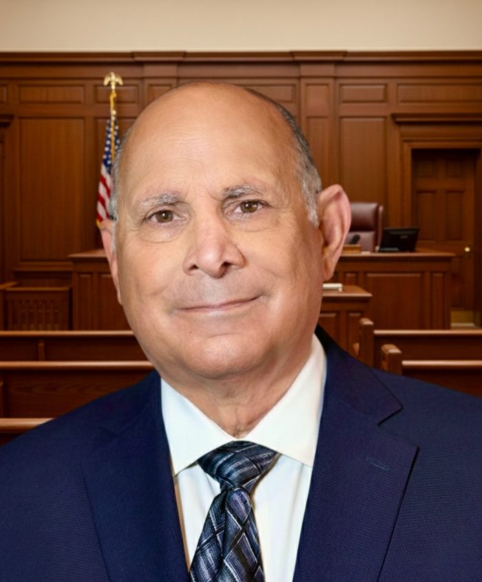 Portrait of Paul Cappitelli in a courtroom